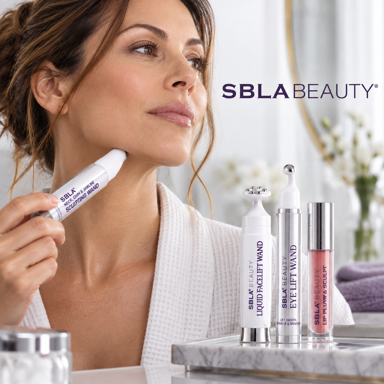 Woman applying an SBLA Beauty sculpting wand along her neck